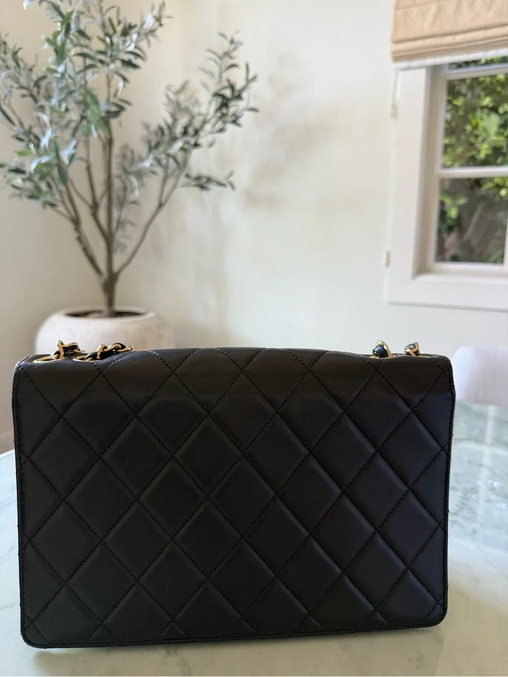 CHANEL Black Quilted Shoulder Bag with Gold Hardware